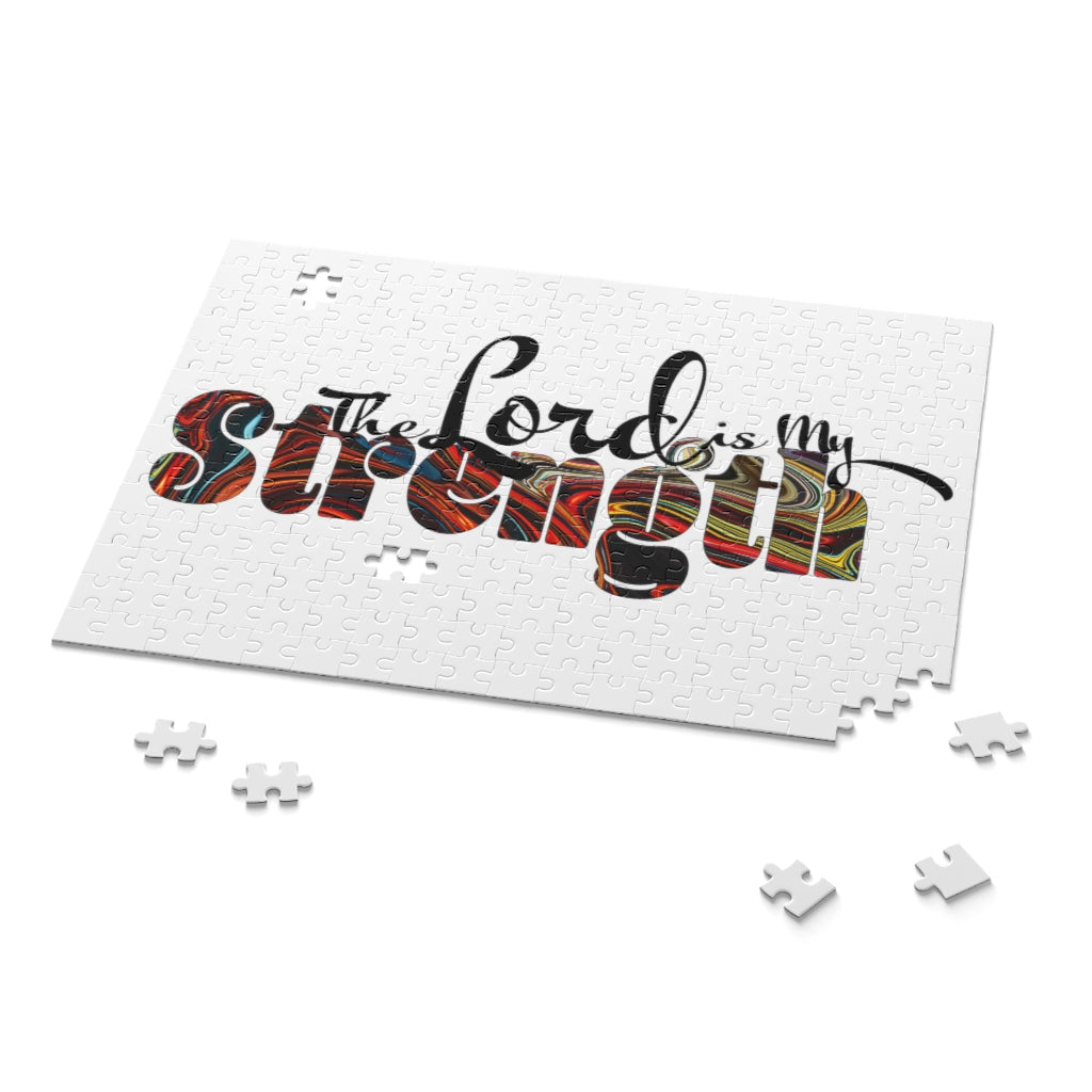 Christian Word Art jigsaw puzzle featuring 'The Lord is My Strength' in vibrant colors, made of high-quality chipboard.